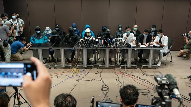 Family members of the Hong Kong activists who attempted to travel to Taiwan at a media conference. Picture: Getty Images