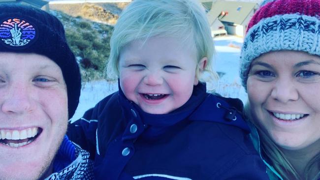 Northern NSW couple Kimberley and Scott Brown with their son Leeuwin. One of the Browns’ twin babies died after intra-uterine surgery this month.