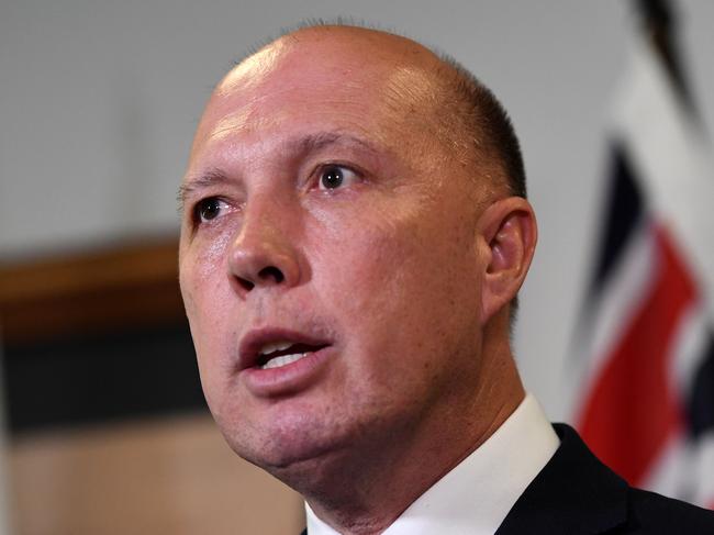 Australian Minister for Home Affairs Peter Dutton speaks during a press conference in Brisbane, Sunday, November 11, 2018. Mr Dutton briefed the media in relation to the Friday terror attack on Bourke Street in Melbourne, in which the perpetrator and another man were killed. (AAP Image/Dan Peled) NO ARCHIVING