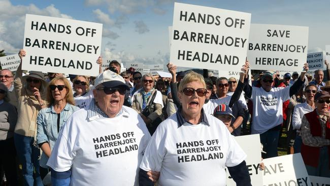 Hundreds of Pittwater locals protested proposed changes to the Barrenjoey Lighthouse precinct at Palm Beach in 2013 and critics are still lobbying for a halt to plans that would enable tourists to pay to stay on the historic headland. Picture: Simon Cocksedge