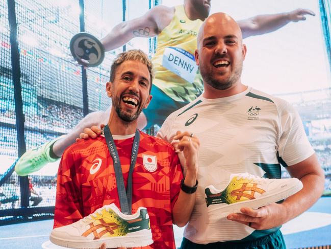 Australian discus thrower Matthew Denny with artist Anarchimyst who painted custum Asics shoes to celebrate Matt's Bronze medal at the paris 2024 Olympic games. Picture: Supplied