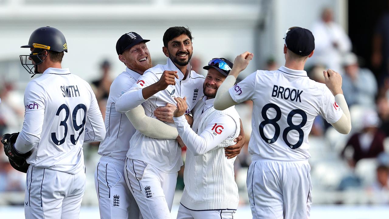 Shoaib Bashir of England celebrates with teammates after bowling out Jason Holder. (Photo by David Rogers/Getty Images)