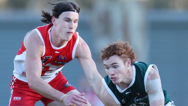 Shepparton Swans player Kade Anderson and Echuca’s Samuel Edgar in action last weekend. Both teams will play on Saturday. Picture Yuri Kouzmin