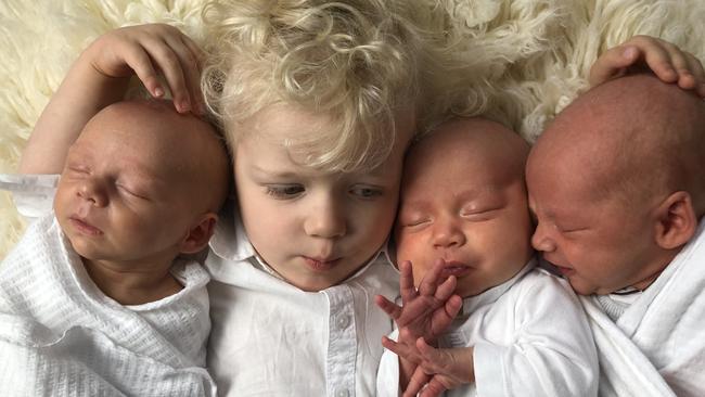 Older brother Zac with his younger triplet siblings Grace, Sam and Edward.