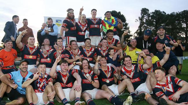 Erina players celebrating the win. Picture: Sue Graham