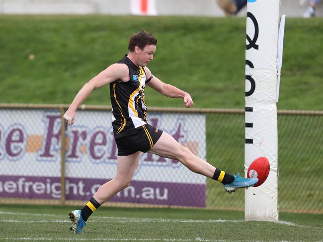 Tigers Luke Graham kicks one of his three goals. Picture: zak simmonds