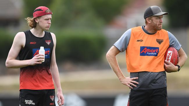 Mason and Dustin Fletcher at an Essendon training session in 2019. Picture: Quinn Rooney/Getty Images