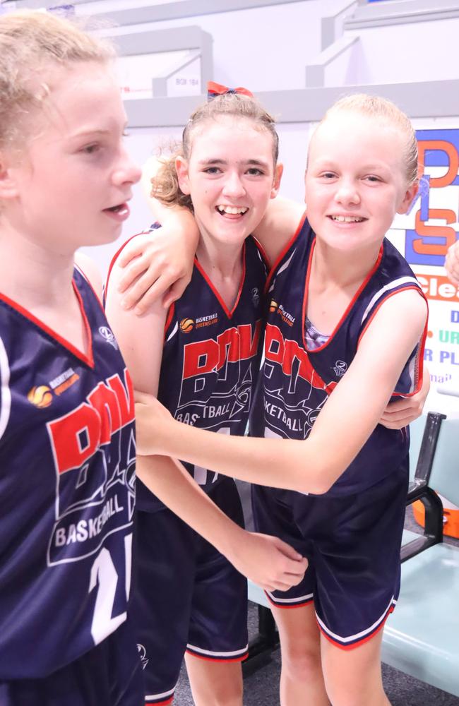 Burdekin Wildcats players celebrate winning the U14 Girls Division 2 title.