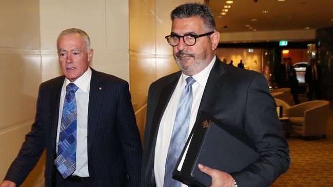 Crown directors John Poynton, left, and Andrew Demetriou arrive for the AGM. Picture: AAP