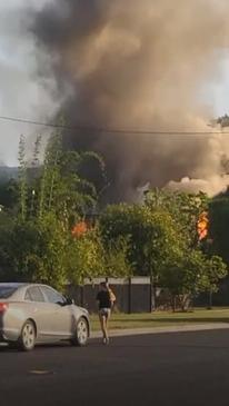 Old Queenslander fully engulfed in flames