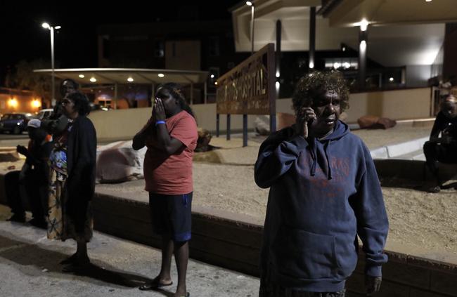 The family of a man shot in Yuendumu outside Alice Springs Hospital. Picture: Emma Murray