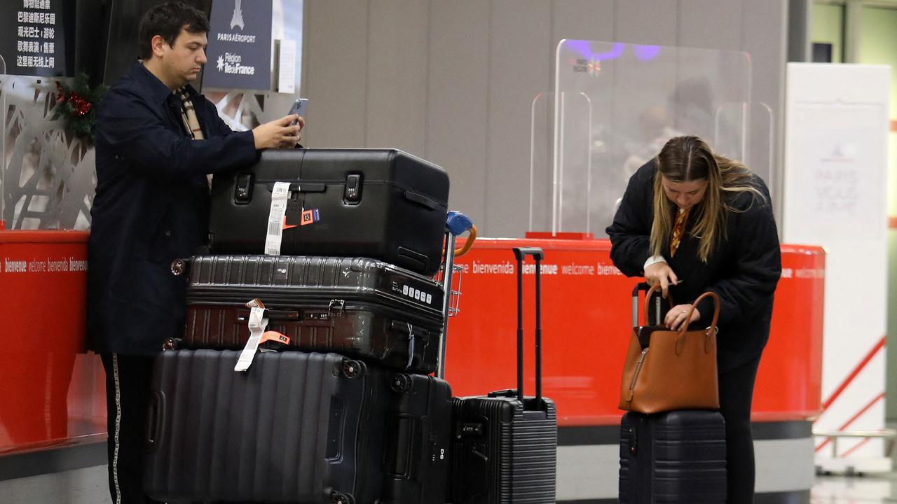 Ms Higgins and her fiance, David Sharaz. Moving across the world requires a fair bit of luggage. Picture: KCS Presse/MEGA