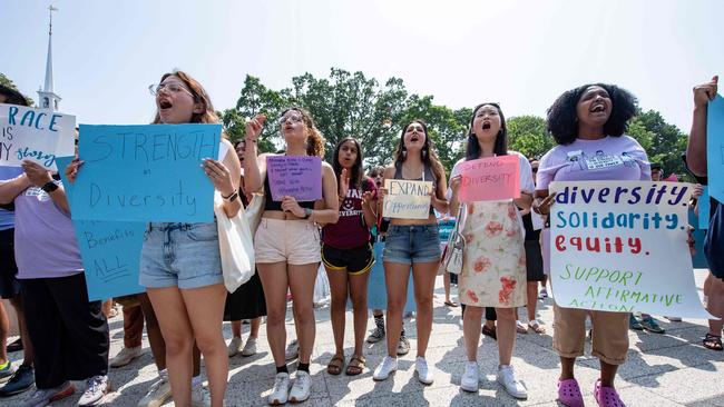 Proponents of affirmative action hold signs during a protest at Harvard University over the weekend. Picture: Joseph Prezioso / AFP