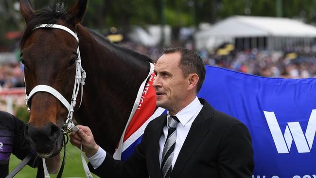 Trainer Chris Waller with Winx after her Cox Plate success.