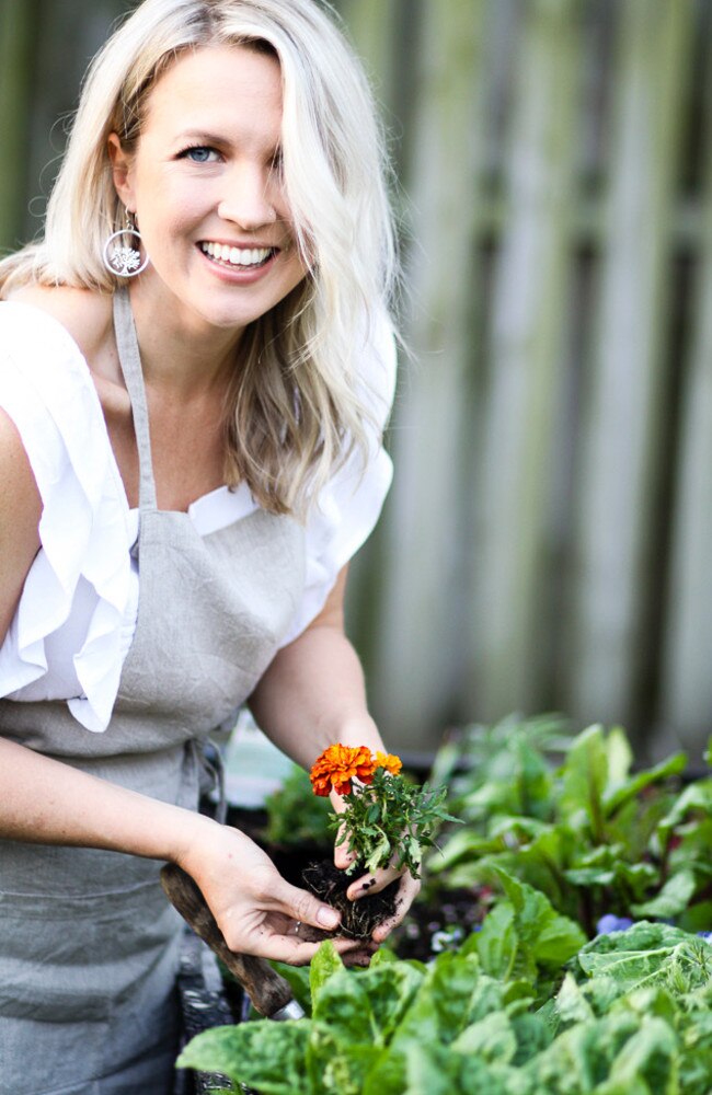 Georgia Barnes getting into her vegie patch in isolation