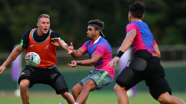 Will Genia passes during training in Odawara. Picture: Getty Images