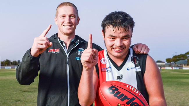 Josh Couch with Port Adelaide player Tom Clurey at training at Bice Oval. Picture: Brenton Edwards