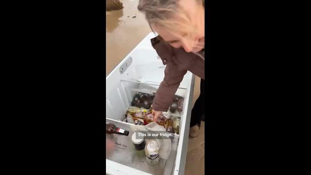 Shocked flood victim finds own fridge washed up on beach 70km away