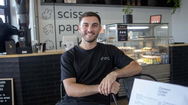 Small business owner Jayke Cuschieri at his cafe Scissors Paper Rock in Capalaba. Picture AAP/Sarah Marshall