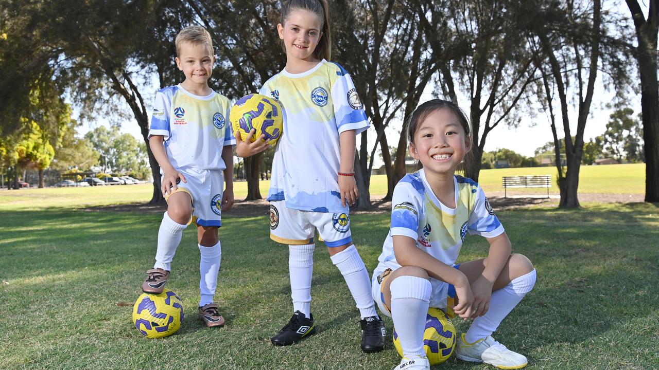 Counting down until the first whistle is blown are teammates Rafael Sciancalepore, 6, Ilijana Lambetis, 6, and Alessia Zhao, 7. Picture: Keryn Stevens