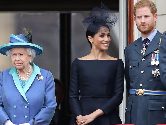 The Queen with Meghan Markle and Prince Harry in 2018. The US-based couple have insisted they are in regular contact with the Queen. Picture: Getty Images