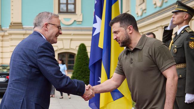 Ukrainian President Volodymyr Zelensky (right) shakes hands with Australian Prime Minister Anthony Albanese before their meeting in Kyiv overnight. Picture: AFP