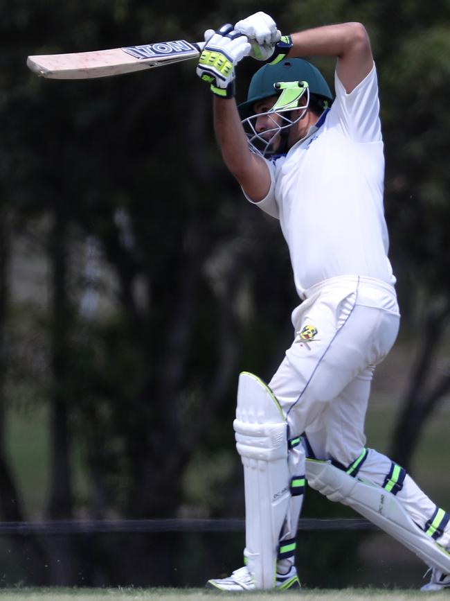 Chris Spinella punches a boundary straight down the ground.