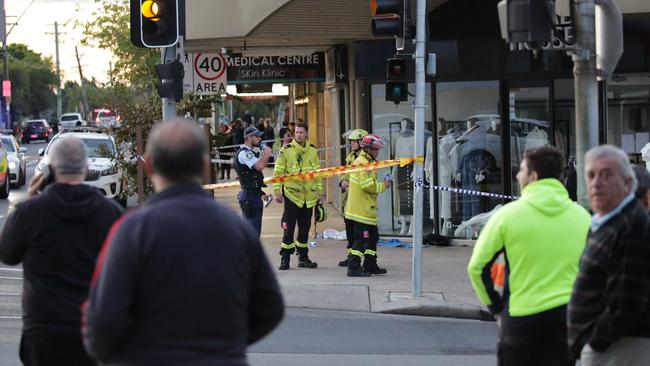 Police and firefighters at the scene of the crash on May 21. Picture: Christian Gilles