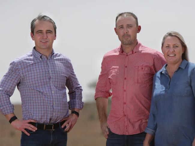 SUNDAY TELEGRAPH SPECIAL. The Commonwealth Bank representatives visit farmers in Dubbo NSW as they begin a drought appeal. (L to R) Commonwealth Bank CEO Matt Comyn with Ben and Jamee Wykes.