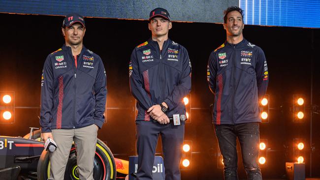 Red Bull Racing's Sergio Perez, Max Verstappen and Daniel Ricciardo. (Photo by ED JONES / AFP)