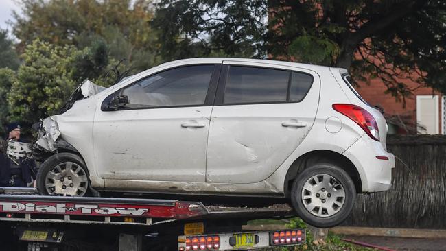 The car is taken away on a tow truck. Picture: Roy VanDerVegt