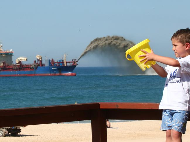 Pictured at Miami Beach  helping with the Sand Pumping Zane Kalic 4 years old from Mermaid beach Ph 0418182881. Picture Mike Batterham