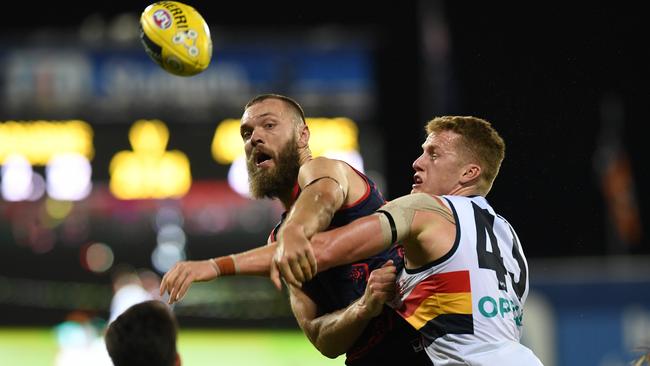 Reilly O’Brien battles Melbourne gun Max Gawn in the ruck. Picture: AAP Image/Dan Peled