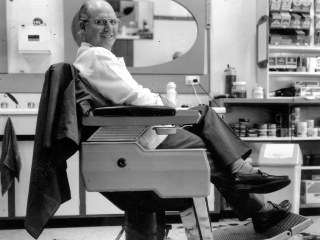 Rundle Street hairdresser Frank sits in his barber’s chair in 1995.