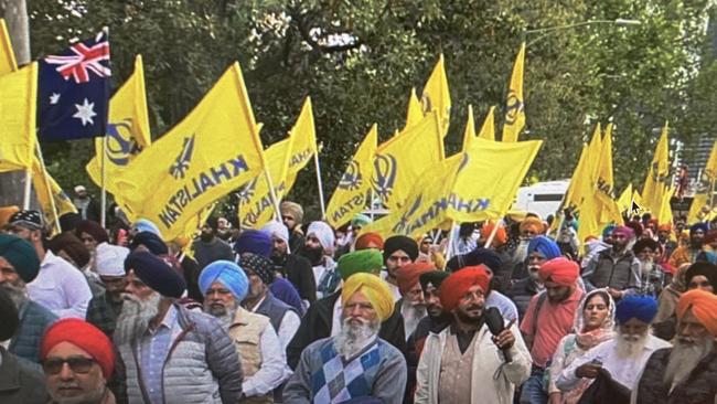 Khalistan supporters wave flags at the Sikh community’s Humanity Walk in Melbourne on November 19.