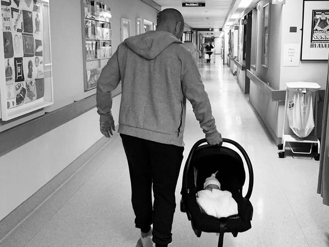 Rugby Union player Aaron Smith, with his new son at Dunedin Public Hospital. Picture: @aaronsmith_1112/Instagram