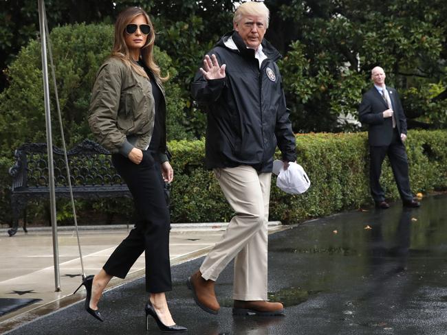 President Donald Trump, accompanied by First Lady Melania Trump, who was called a Barbie for wearing heels. Picture: AP Photo/Jacquelyn Martin