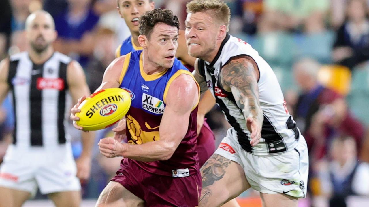 Neale carries the ball as the Lions quickly assert their authority after a sluggish opening. Picture: AFL Photos via Getty Images