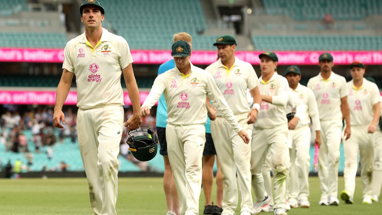 Pat Cummins leads his team off after Australia’s draw with England at the SCG. Picture: Getty Images