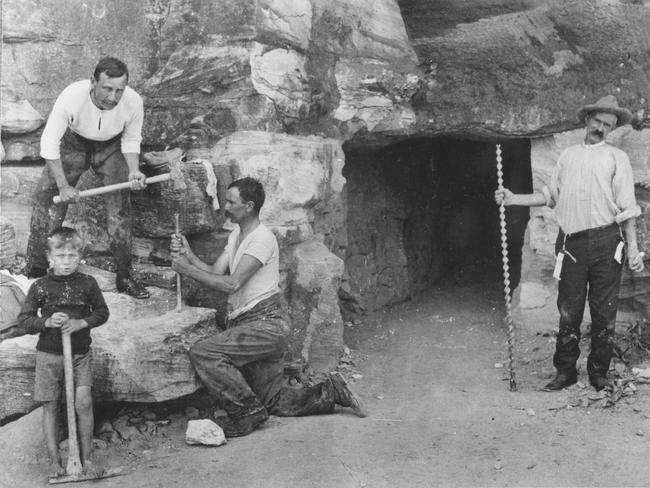 Robert Lewers, far left, posing with D. Bevan, the man who excavated the tunnel in 1908. Picture Sonia Farley, Northern Beaches Library