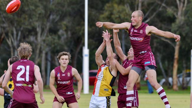 Old Reds defender Will Dalwood spoils the ball at Park 9 on Saturday. Picture: Brenton Edwards