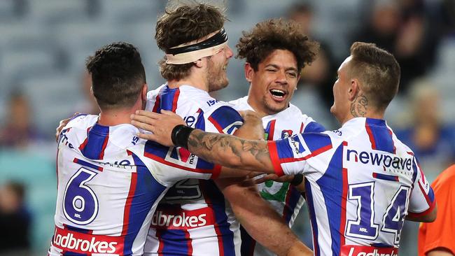 Newcastle celebrate a try against the Eels. Photo: Brett Costello