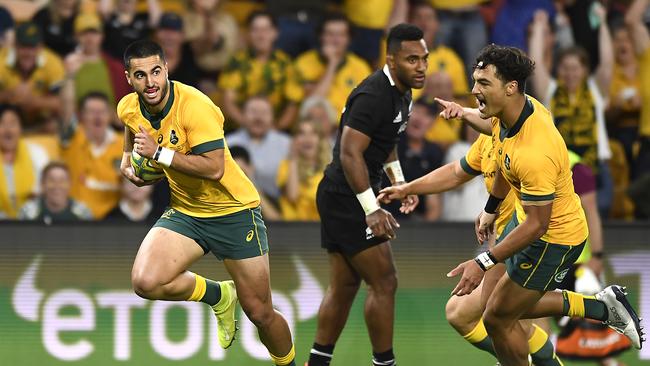 Tom Wright scored with his first touch in Test rugby and he and Jordan Petaia are competing for back three spots. Photo: Getty Images