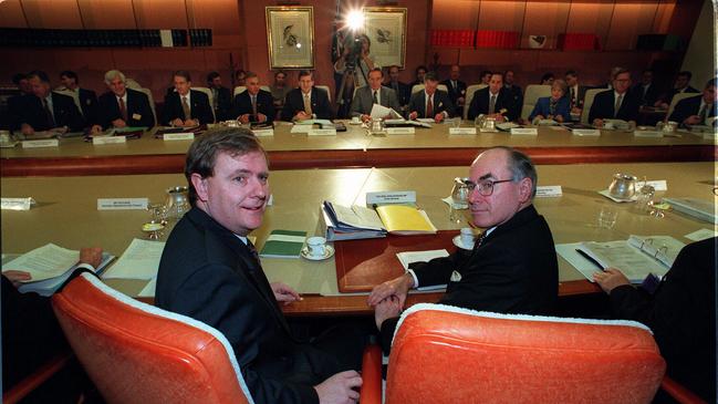 Peter Costello, left, and John Howard with the nation’s premiers in 1996. Picture: Lyndon Mechielsen