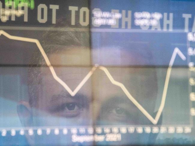 SYDNEY, AUSTRALIA - NewsWire Photos September 27, 2021: Information boards seen through the windows at the Australian Securities Exchange, Sydney. Picture: NCA NewsWire / James Gourley