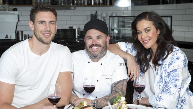 Megan Gale, AFL player Shaun Hampson and chef Dave Stewart are reeling after thieves broke into their Ascot Vale restaurant. Picture: Sarah Matray