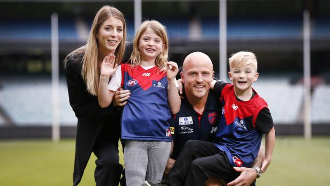 Nathan Jones with wife Jerri and their kids, Bobbi and Remy, at the MCG. Picture: David Caird