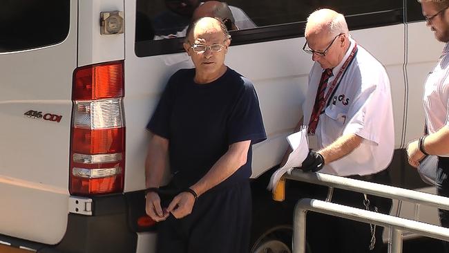 Domenic Perre being led into Adelaide Magistrate’s Court after his arrest. Picture: Nine News