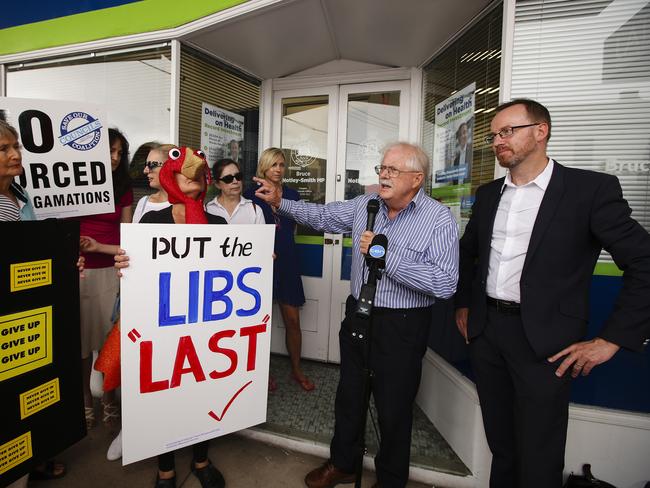 Phil Jenkyn, of Save Our Councils Coalition, and David Shoebridge protest outside Bruce Notley-Smith’s electorate office in Randwick against forced council amalgamations. Picture: Justin Lloyd