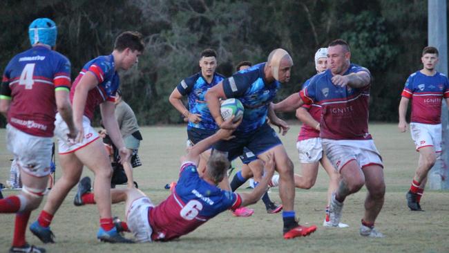 (GCDRU) Former Brumbies winger Lausii Taliauli scored a double for the Helensvale Hogs against Bond Pirates on May 15, 2021. Picture: Verna Kaaka.